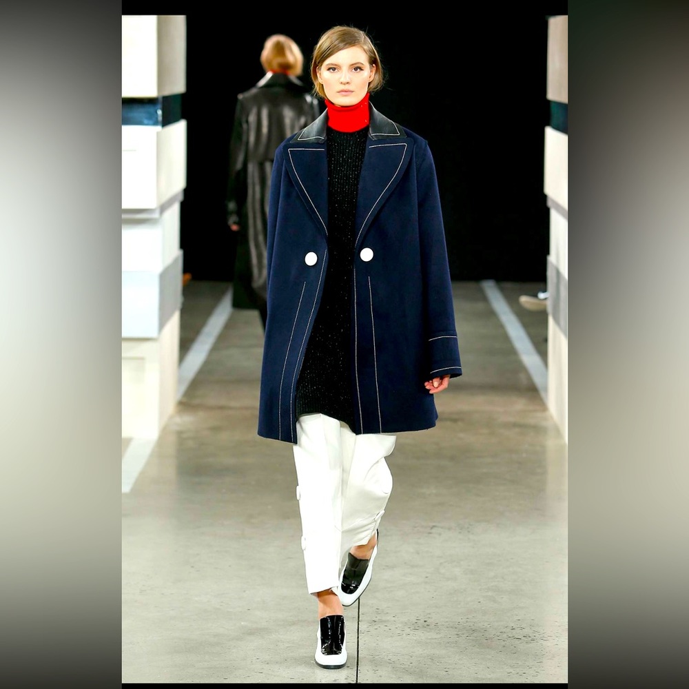 Edun coat with lamb skin details. New with tags.  Sz L.